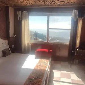 New Malook Hotel,mall Road,near Domino's Pizza Shimla